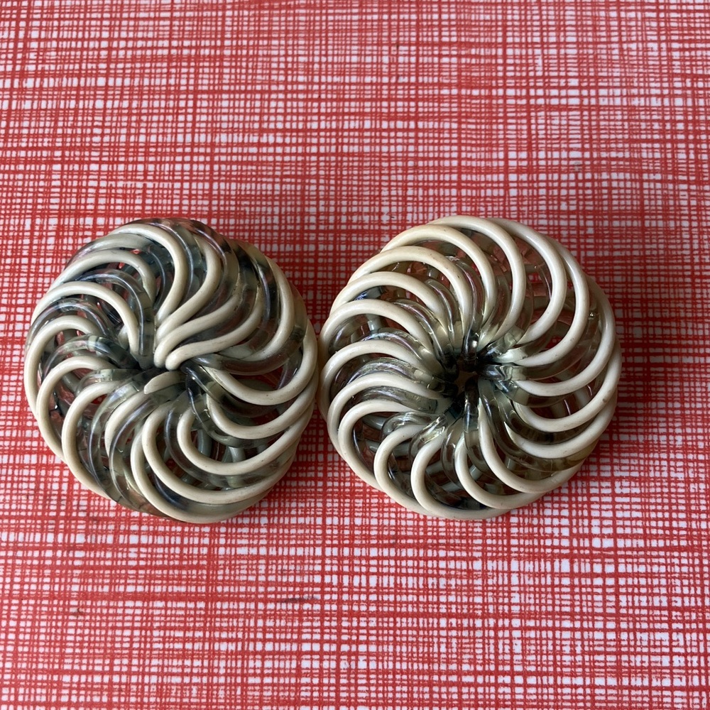 Vintage set of two large extruded string celluloid swirl buttons
